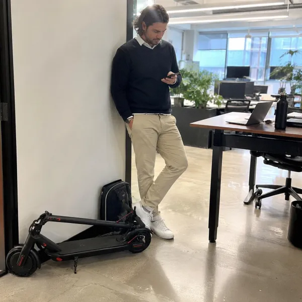 Riding the electric scooter through the city